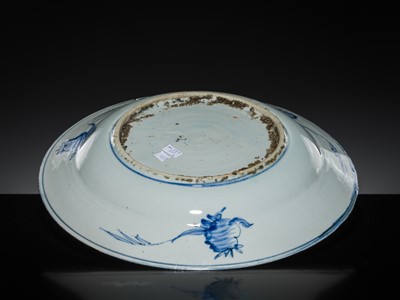 Lot 163 - A LARGE BLUE AND WHITE ‘SCHOLAR’ DISH, WANLI PERIOD
