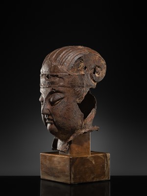 Lot 107 - A LARGE CAST IRON HEAD OF A DAOIST DEITY, MING DYNASTY