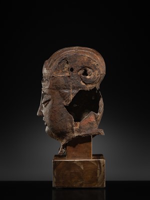 Lot 107 - A LARGE CAST IRON HEAD OF A DAOIST DEITY, MING DYNASTY
