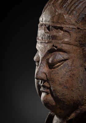Lot 107 - A LARGE CAST IRON HEAD OF A DAOIST DEITY, MING DYNASTY