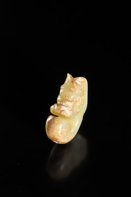 Lot 54 - A SMALL CELADON AND RUSSET JADE ‘PIG DRAGON’, ZHULONG, HONGSHAN CULTURE