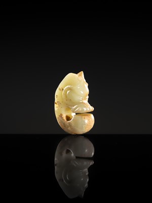 Lot 54 - A SMALL CELADON AND RUSSET JADE ‘PIG DRAGON’, ZHULONG, HONGSHAN CULTURE