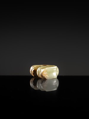 Lot 54 - A SMALL CELADON AND RUSSET JADE ‘PIG DRAGON’, ZHULONG, HONGSHAN CULTURE