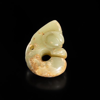 Lot 54 - A SMALL CELADON AND RUSSET JADE ‘PIG DRAGON’, ZHULONG, HONGSHAN CULTURE