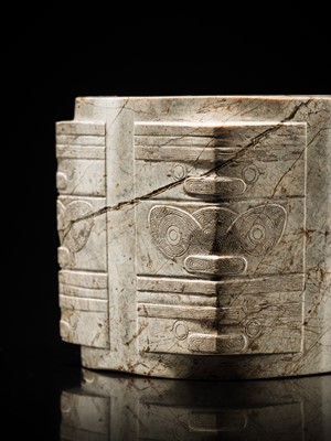 Lot 58 - AN EXTREMELY RARE THREE-TIERED IVORY-WHITE JADE CONG, LIANGZHU CULTURE