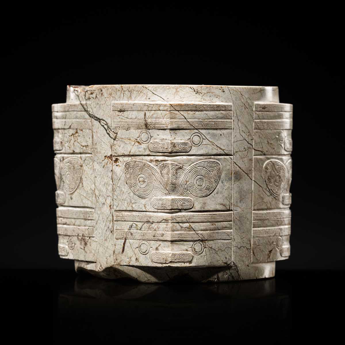 Lot 58 - AN EXTREMELY RARE THREE-TIERED IVORY-WHITE JADE CONG, LIANGZHU CULTURE