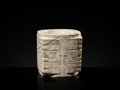 Lot 58 - AN EXTREMELY RARE THREE-TIERED IVORY-WHITE JADE CONG, LIANGZHU CULTURE