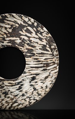 Lot 63 - AN UNUSUAL BLACK AND WHITE ‘STRIPED’ MARBLE DISK, BI, LATE NEOLITHIC PERIOD-EARLY BRONZE AGE