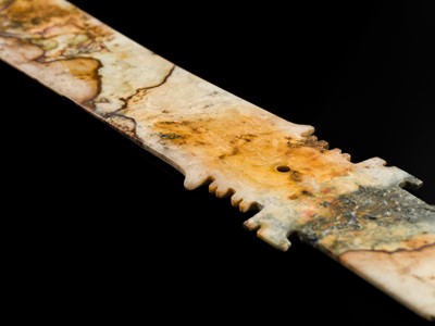 Lot 66 - A LARGE (47 CM) AND EXCEPTIONAL ‘CLOUDED’ JADE CEREMONIAL BLADE, ZHANG, SHANG DYNASTY
