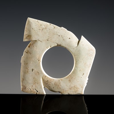 Lot 224 - AN IVORY WHITE NOTCHED JADE DISK, YABI, DAWENKOU OR LONGSHAN CULTURE