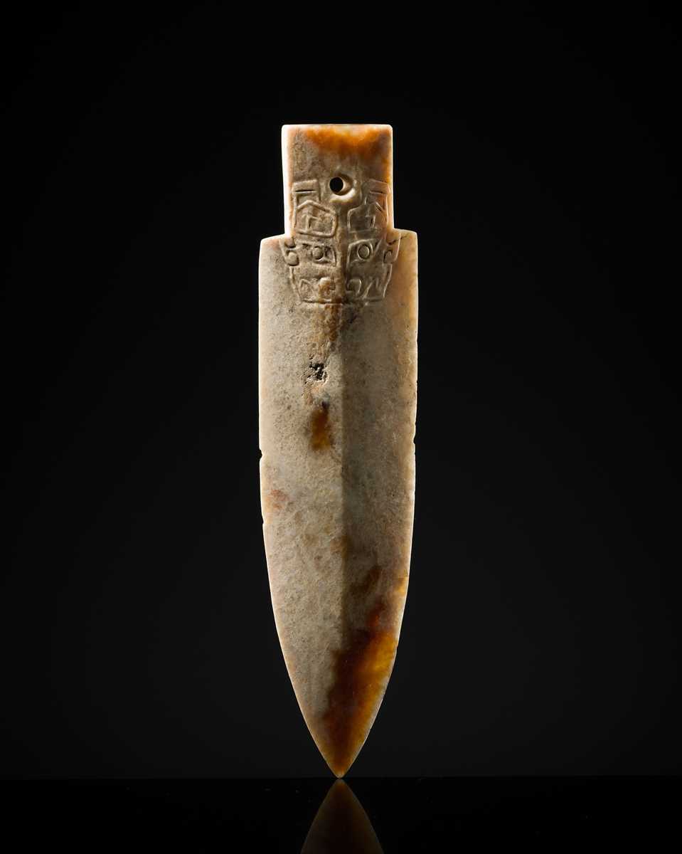 Jade Ritual Dagger Lot 68 - A RARE JADE ‘TAOTIE’ CEREMONIAL DAGGER-AXE,