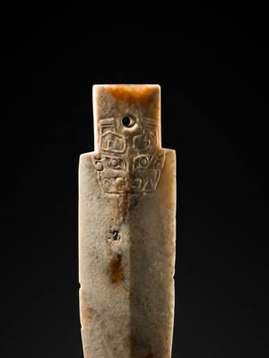 Lot 68 - A RARE JADE ‘TAOTIE’ CEREMONIAL DAGGER-AXE, GE, LATE SHANG DYNASTY, ANYANG PHASE