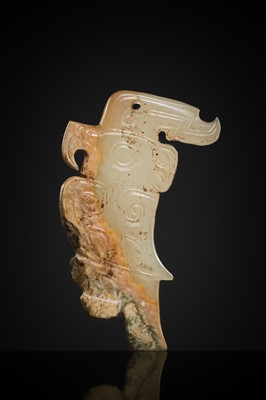 Lot 71 - A RARE PALE GREENISH-WHITE AND RUSSET JADE ‘BIRD’ PENDANT, LATE SHANG DYNASTY, 13TH-11TH CENTURY BC