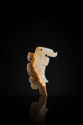 Lot 71 - A RARE PALE GREENISH-WHITE AND RUSSET JADE ‘BIRD’ PENDANT, LATE SHANG DYNASTY, 13TH-11TH CENTURY BC