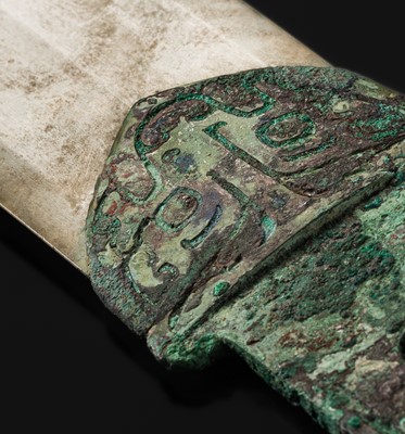 Lot 67 - A VERY RARE JADE HALBERD BLADE WITH BRONZE SHAFT, GE, LATE SHANG DYNASTY, ANYANG PHASE