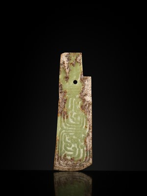 Lot 81 - A GREEN AND BROWN JADE ‘BIRDS AND DRAGON’ CEREMONIAL BLADE, WESTERN ZHOU DYNASTY
