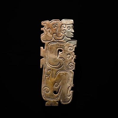 Lot 78 - A BROWN AND IVORY-WHITE JADE ‘HUMANOID-DRAGON’ PENDANT, MID-LATE WESTERN ZHOU DYNASTY