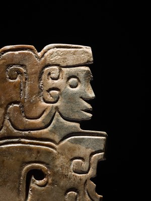 Lot 78 - A BROWN AND IVORY-WHITE JADE ‘HUMANOID-DRAGON’ PENDANT, MID-LATE WESTERN ZHOU DYNASTY