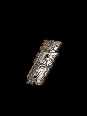 Lot 78 - A BROWN AND IVORY-WHITE JADE ‘HUMANOID-DRAGON’ PENDANT, MID-LATE WESTERN ZHOU DYNASTY