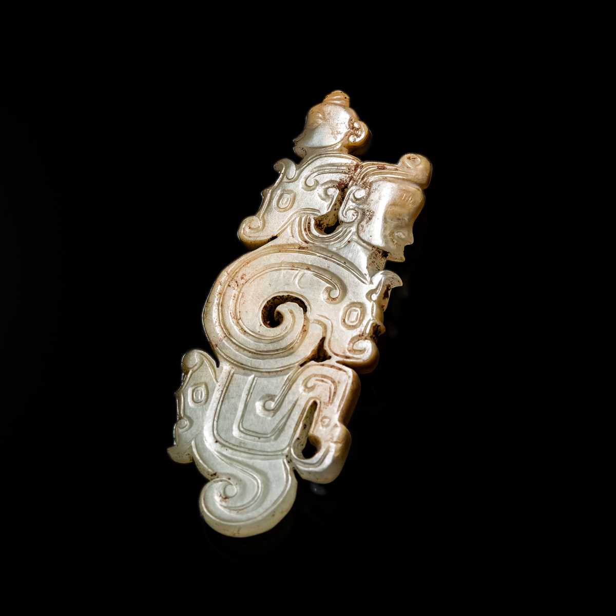 Lot 79 - A SUPERB CELADON JADE ‘HUMAN-DRAGON’ PENDANT, MID-LATE WESTERN ZHOU DYNASTY
