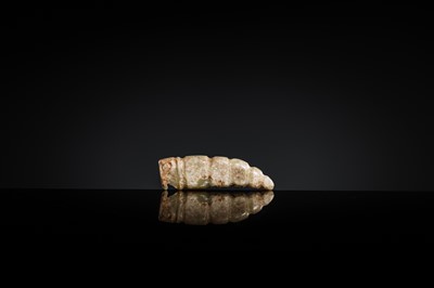 Lot 72 - A CELADON JADE ‘SILKWORM’ PENDANT, LATE SHANG DYNASTY