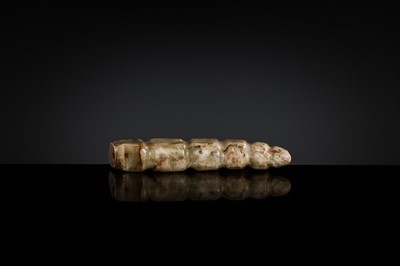 Lot 72 - A CELADON JADE ‘SILKWORM’ PENDANT, LATE SHANG DYNASTY