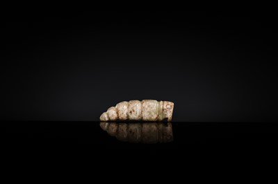 Lot 72 - A CELADON JADE ‘SILKWORM’ PENDANT, LATE SHANG DYNASTY