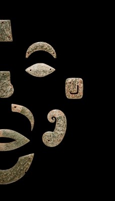 Lot 85 - A RARE GREEN JADE FUNERARY MASK, WESTERN ZHOU DYNASTY, 10TH CENTURY BC