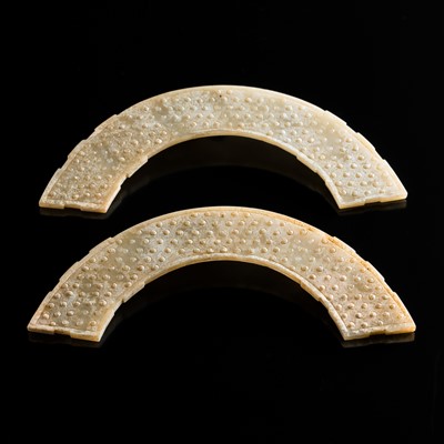 Lot 232 - A PAIR OF PALE CELADON JADE PENDANTS, HUANG, EASTERN ZHOU DYNASTY