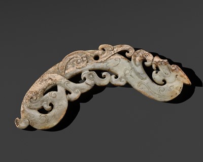 Lot 240 - A GREEN JADE ‘PHOENIX AND DRAGON’ OPENWORK PENDANT, EASTERN ZHOU PERIOD