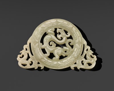 Lot 252 - A PALE CELADON JADE ‘CHILONG’ PENDANT, EASTERN ZHOU TO WESTERN HAN