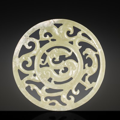 Lot 238 - A CELADON JADE ‘DRAGON AND PHOENIX’ DISK, LATE EASTERN ZHOU - EARLY WESTERN HAN