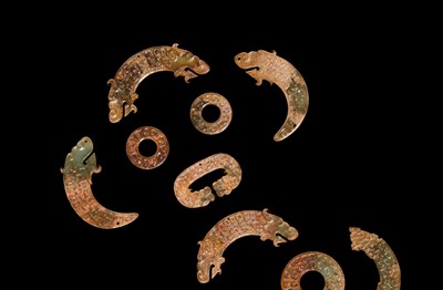 Lot 86 - A SET OF SEVENTEEN JADE PENDANTS, EASTERN ZHOU DYNASTY, SPRING AND AUTUMN PERIOD