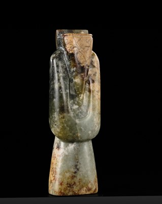 Lot 90 - A MOTTLED GREEN AND BROWN JADE FIGURE OF A BEARDED SAGE, HAN DYNASTY
