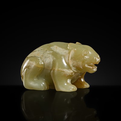 Lot 243 - A YELLOW JADE FIGURE OF A BEAR, WESTERN HAN DYNASTY