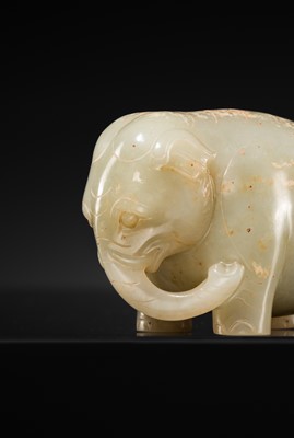 Lot 99 - AN OUTSTANDING AND EXTREMELY RARE CELADON JADE FIGURE OF AN ELEPHANT, HAN DYNASTY