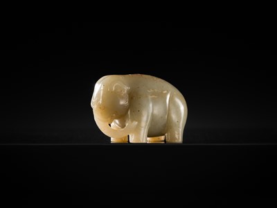 Lot 99 - AN OUTSTANDING AND EXTREMELY RARE CELADON JADE FIGURE OF AN ELEPHANT, HAN DYNASTY