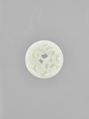 Lot 785 - A WHITE JADE BI DISC WITH CHILONG, LATE QING TO REPUBLIC