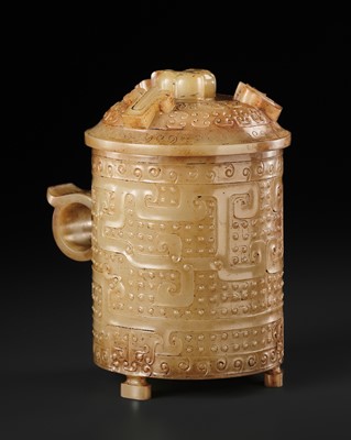 Lot 107 - A RARE YELLOW AND RUSSET JADE ‘PHOENIX’ WINE CUP AND COVER, ZHI, HAN DYNASTY