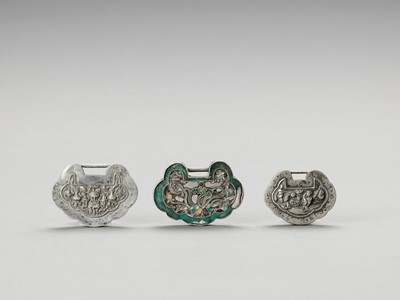 Lot 900 - TWO SILVER AND ONE SILVERED METAL LOCK CHARM, LATE QING