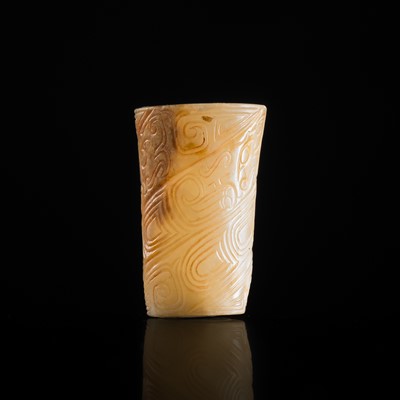 Lot 229 - A WHITE AND RUSSET JADE CONICAL BEAD, WESTERN ZHOU DYNASTY