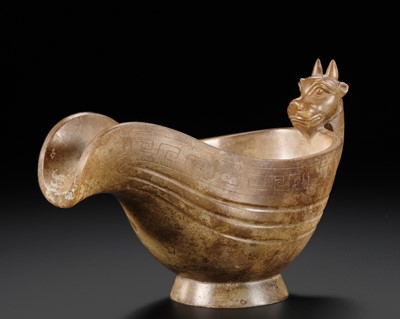 Lot 105 - A BROWN JADE POURING VESSEL, YI, HAN DYNASTY