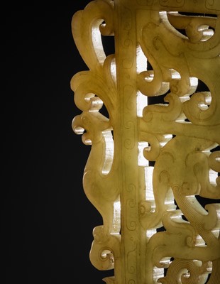 Lot 98 - A SUPERB CELADON AND BLACK JADE ‘CHILONG AND PHOENIX’ OPENWORK PLAQUE, HAN DYNASTY