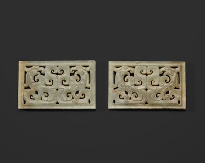 A RARE PAIR OF SMALL PALE GREEN JADE ‘PHOENIX’ PLAQUES, EASTERN ZHOU DYNASTY