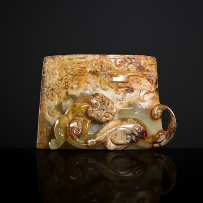 Lot 242 - A CELADON AND RUSSET JADE ‘DRAGON’ SCABBARD CHAPE, WESTERN HAN DYNASTY