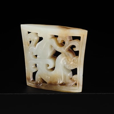 A WHITE AND RUSSET JADE ‘DRAGON’ SCABBARD CHAPE, WESTERN HAN DYNASTY