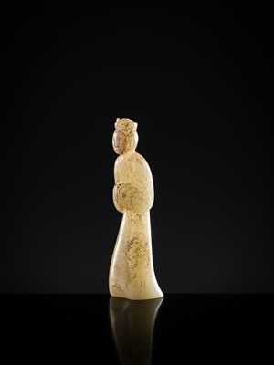 Lot 96 - AN EXCEEDINGLY RARE AND IMPORTANT GRAYISH-WHITE JADE FIGURE OF A COURT LADY, EARLY WESTERN HAN DYNASTY