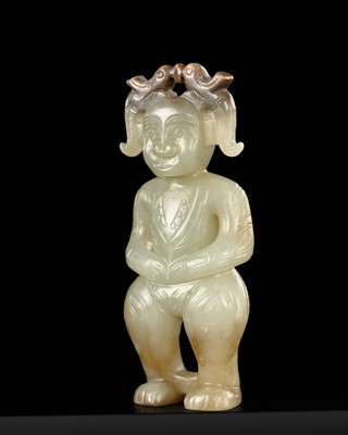 Lot 77 - A PALE CELADON AND BROWN JADE STANDING FIGURE, WESTERN ZHOU DYNASTY