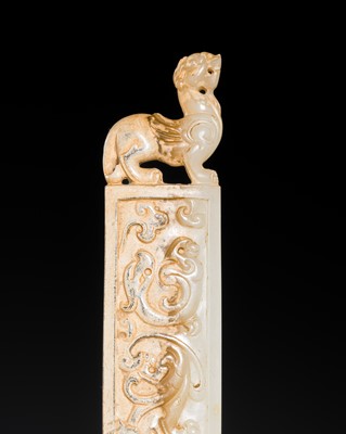 Lot 247 - A CELADON AND WHITE JADE ‘BI XIE’ ORNAMENT, WESTERN JIN DYNASTY