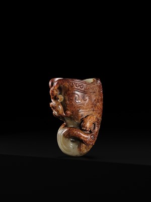 Lot 103 - AN EXCEPTIONAL AND IMPORTANT CELADON AND RUSSET ‘CHILONG’ RHYTON, HAN DYNASTY